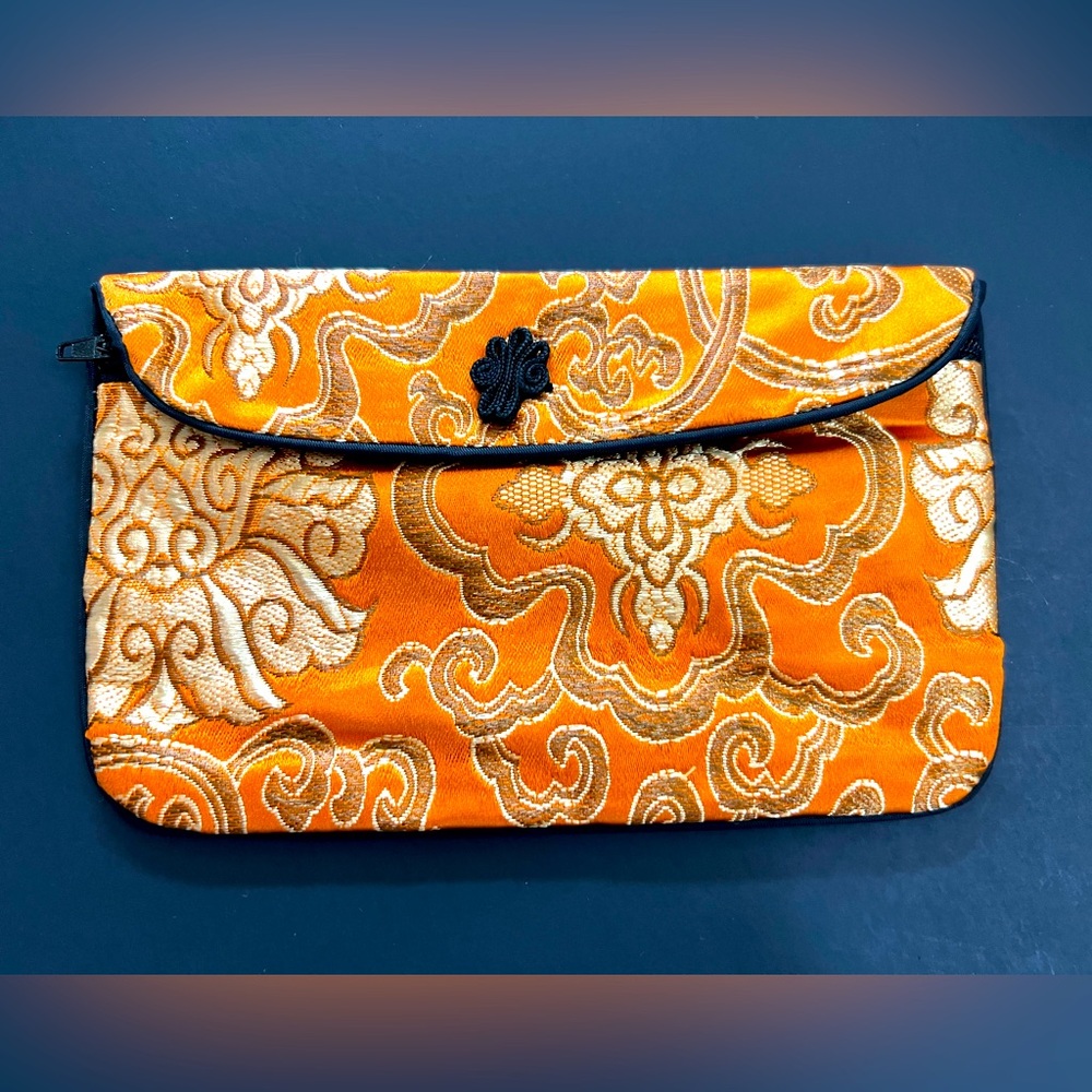 Super cute small orange and gold change purse from China